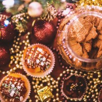 Christmas spread with cakes, baubles and beads. 