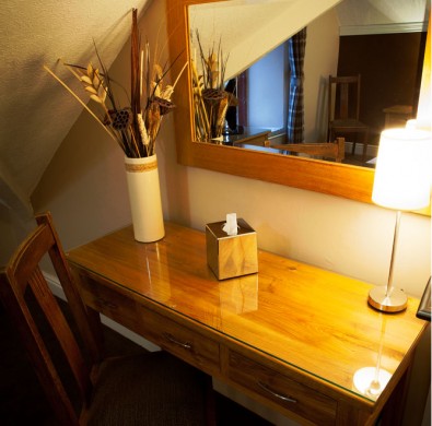 Hardwood desk at boutique hotel The Hideaway