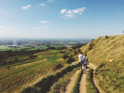 Picture of a couple walking on a sunny day 